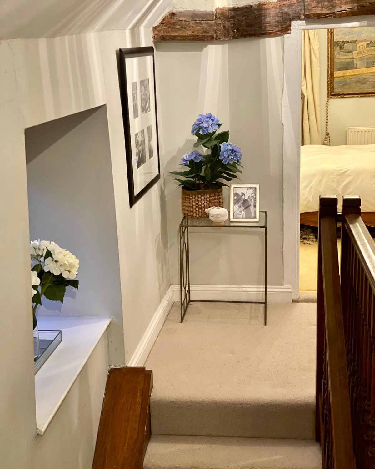 Metal structure side table with glass top.