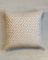 Beige greek key print cushion covers printed on a cream cotton fabric.