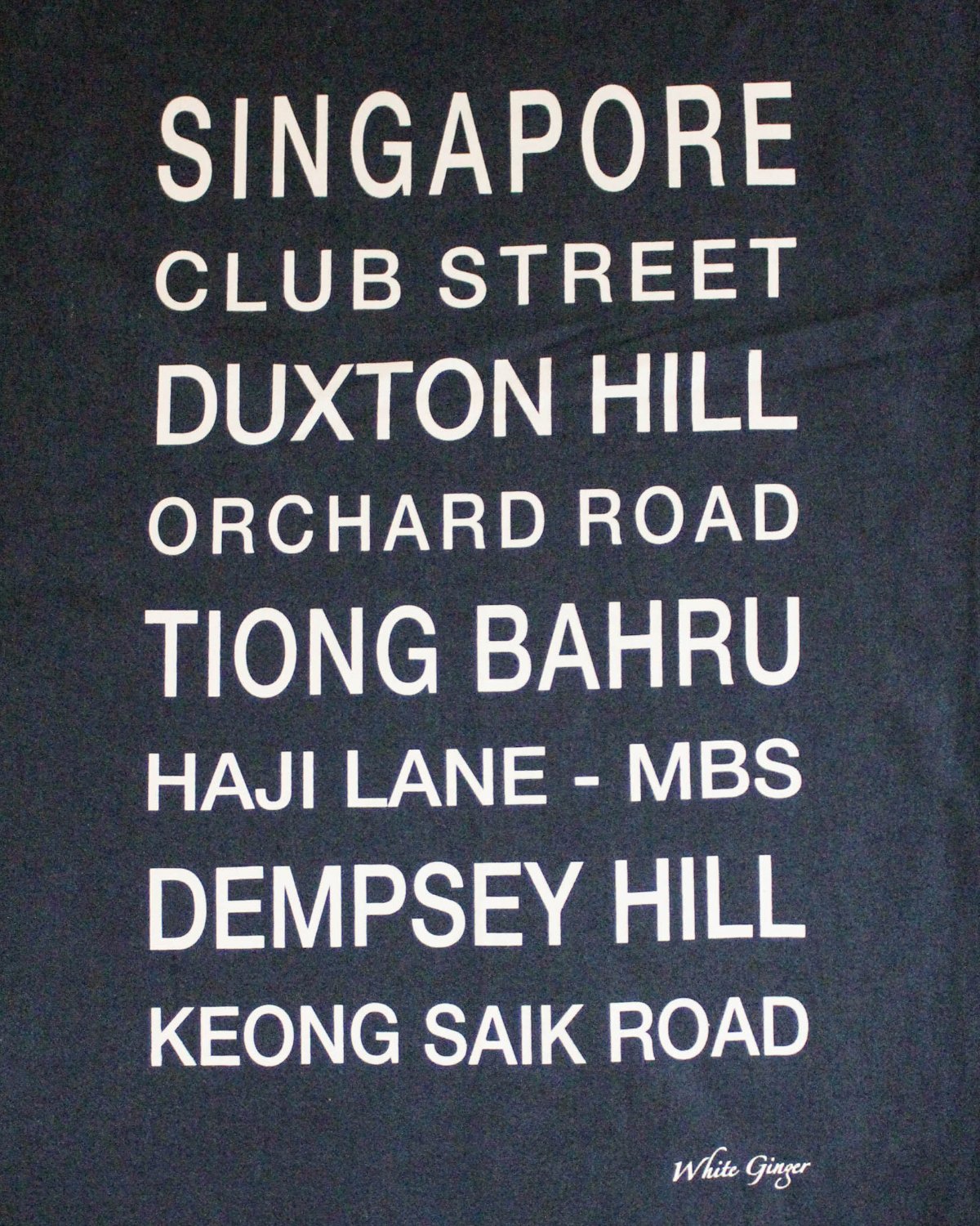 Navy tea towel printed with the famous locations in SIngapore.