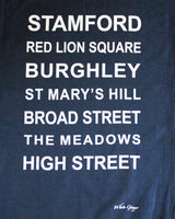 Navy tea towel printed with the famous locations in Stamford.